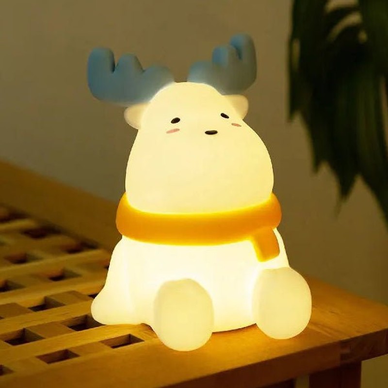 Bordlampa i form av en ren med integrerat LED-ljus