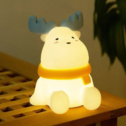 Bordlampa i form av en ren med integrerat LED-ljus