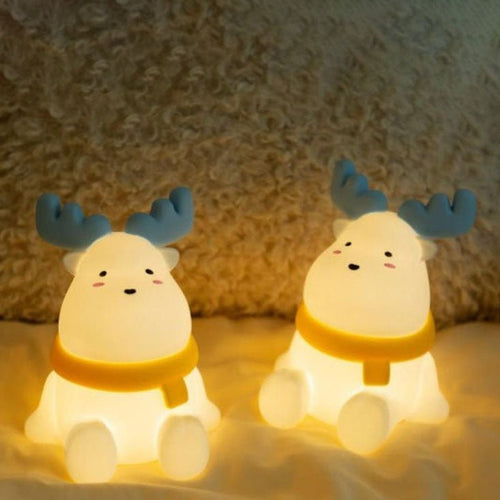 Bordlampa i form av en ren med integrerat LED-ljus