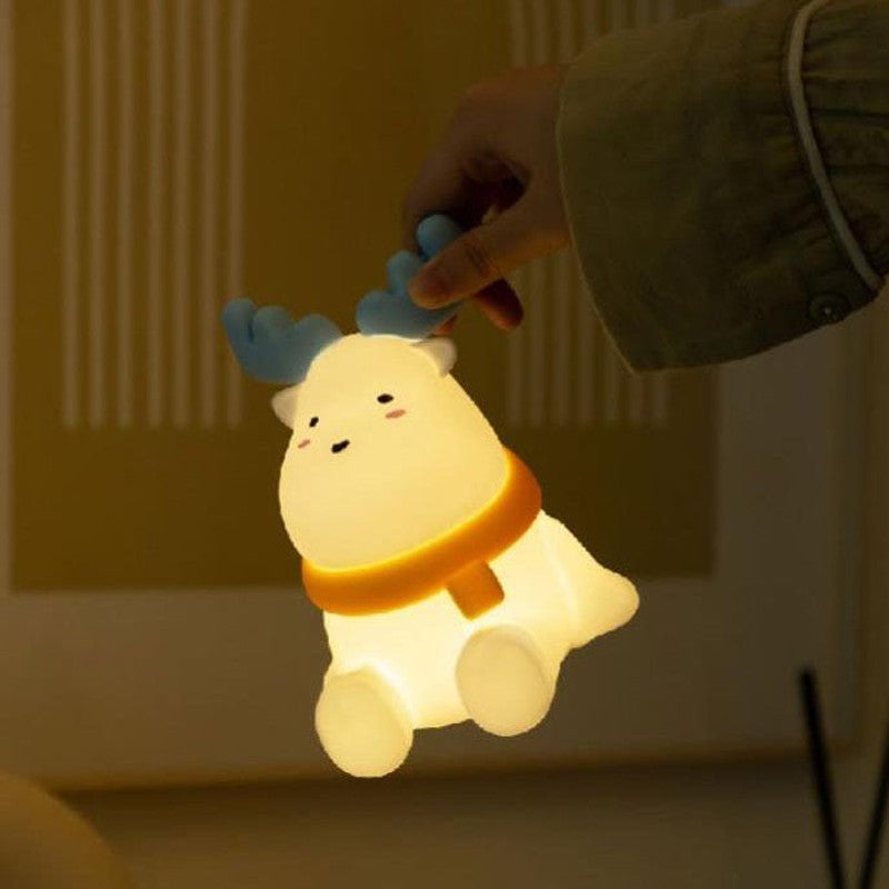 Bordlampa i form av en ren med integrerat LED-ljus