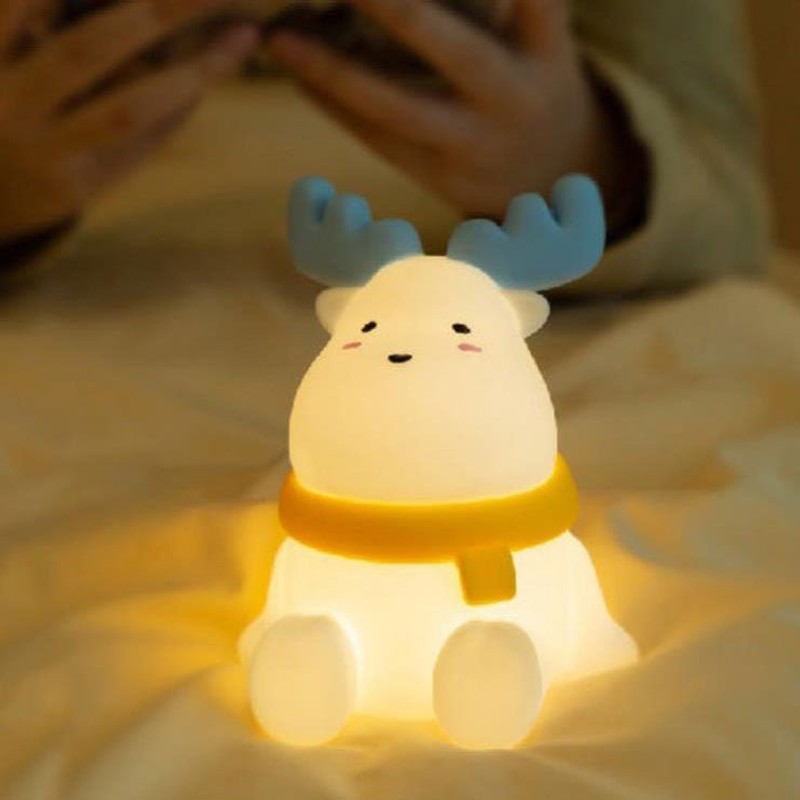 Bordlampa i form av en ren med integrerat LED-ljus