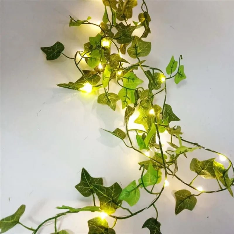 LED-ljusslinga med lövdekorationer