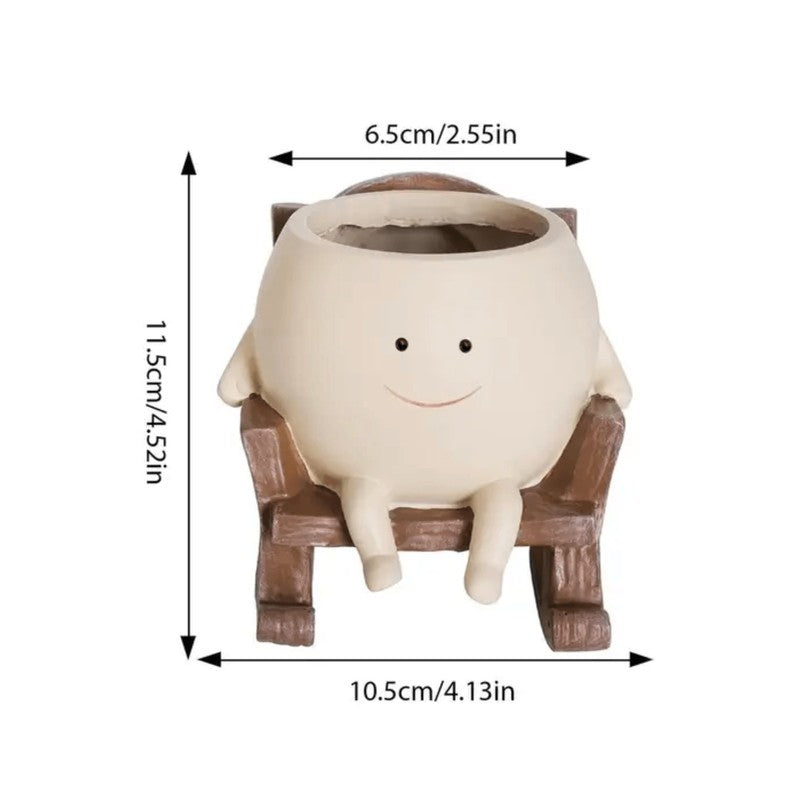 Planter med leende ansikte - Resin med gungstol