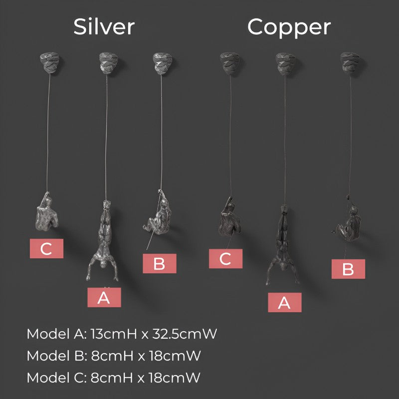 Set av väggskulpturer - klättrande figurer