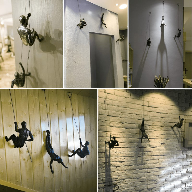 Set av väggskulpturer - klättrande figurer